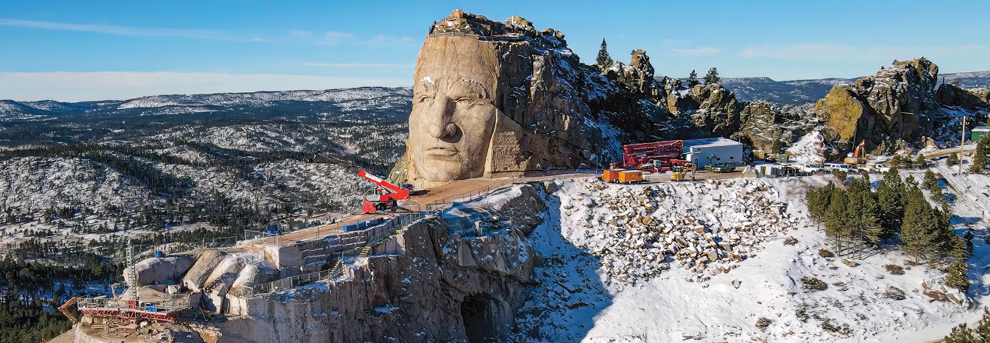 Image of a mountain with a large head sculpted in it