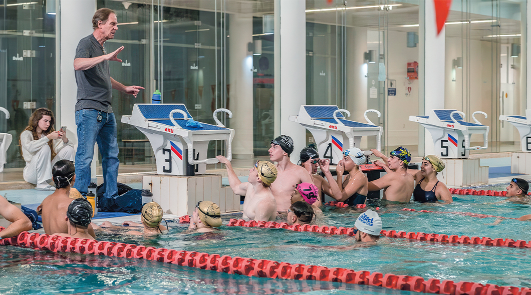 Photo of swimmers practicing in pool